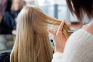 3587499-woman-receiving-haircut